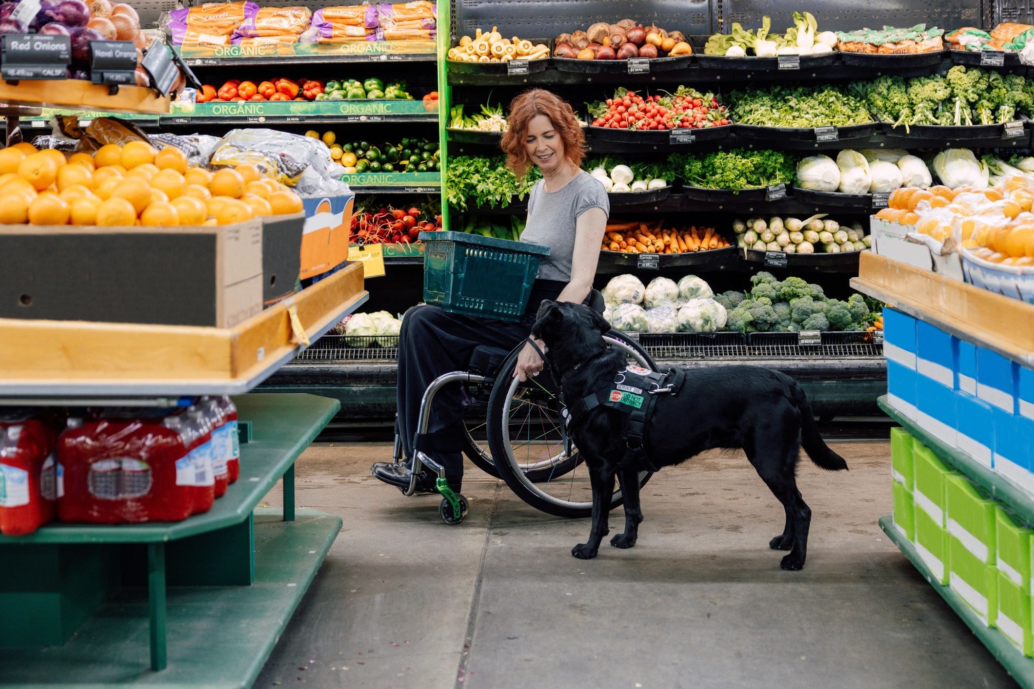 Service dog handler being welcomed into a retail store